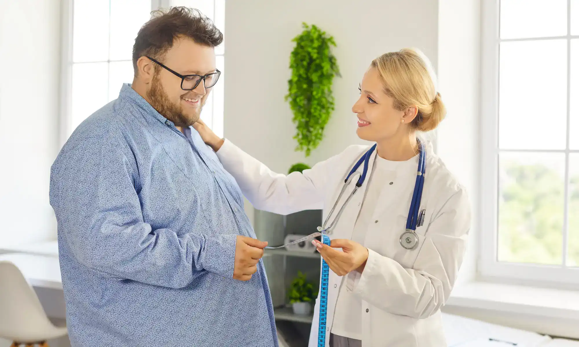 Doctor providing personalized weight management guidance and treatment during a patient consultation.